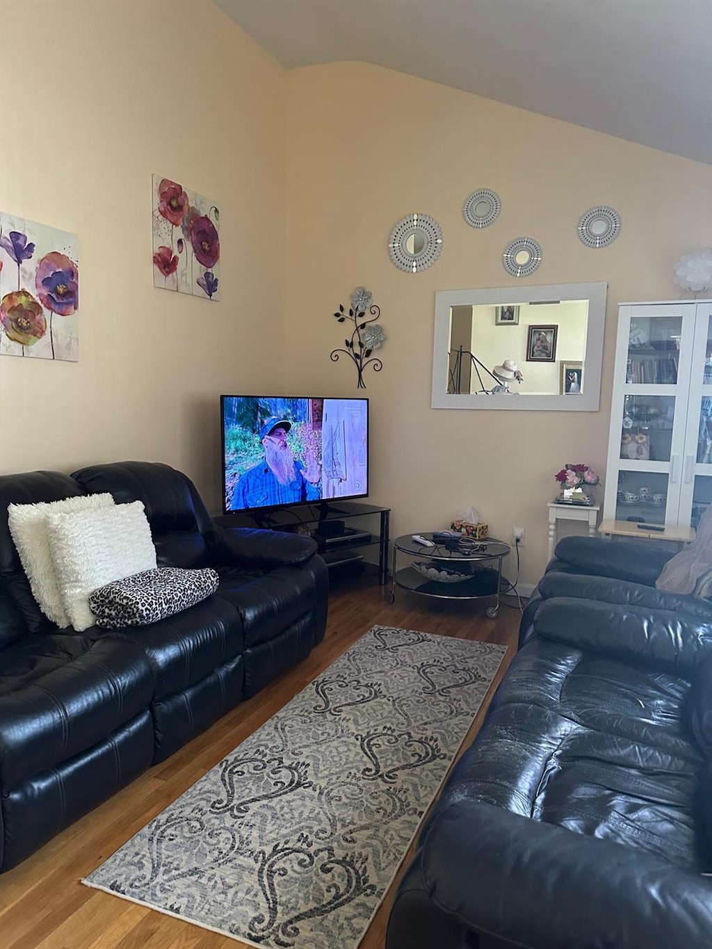 28 Glenda Dr, Deer Park, NY 11729 - living area featuring lofted ceiling and wood finished floors
