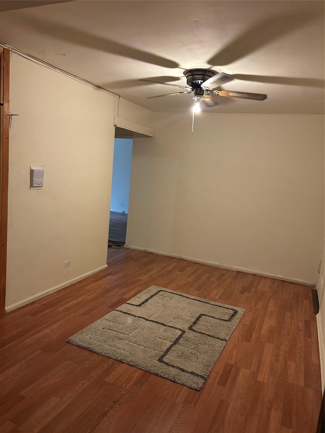 83-75 118th St Unit 4H, Kew Gardens, NY 11415 - empty room with ceiling fan, wood finished floors, and baseboards