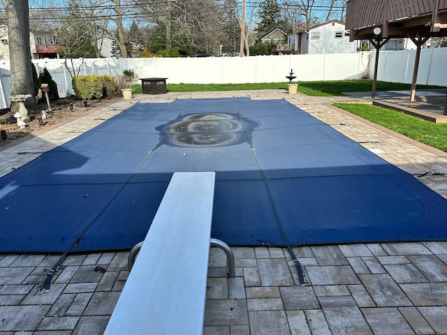 33 41st St, Islip, NY 11751 - view of pool featuring a diving board and a fenced backyard
