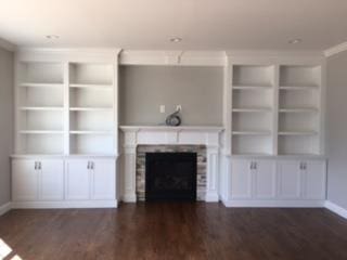 267 N Elm St, Massapequa, NY 11758 - unfurnished living room with dark wood-style floors, baseboards, and a fireplace