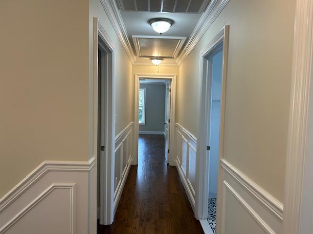267 N Elm St, Massapequa, NY 11758 - hallway featuring attic access, a decorative wall, wainscoting, dark wood-style floors, and ornamental molding