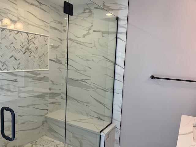 267 N Elm St, Massapequa, NY 11758 - bathroom featuring a marble finish shower