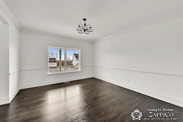unfurnished room with an inviting chandelier, wood finished floors, baseboards, and ornamental molding