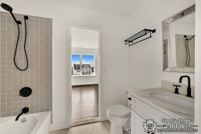 full bathroom featuring baseboards,  shower combination, toilet, tile patterned flooring, and vanity