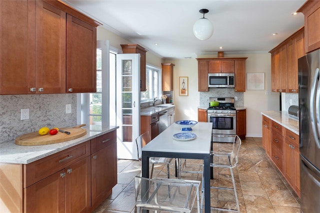 157 Alta Ave, Yonkers, NY 10705 - kitchen featuring brown cabinets, a sink, stainless steel appliances, stone finish floor, and backsplash