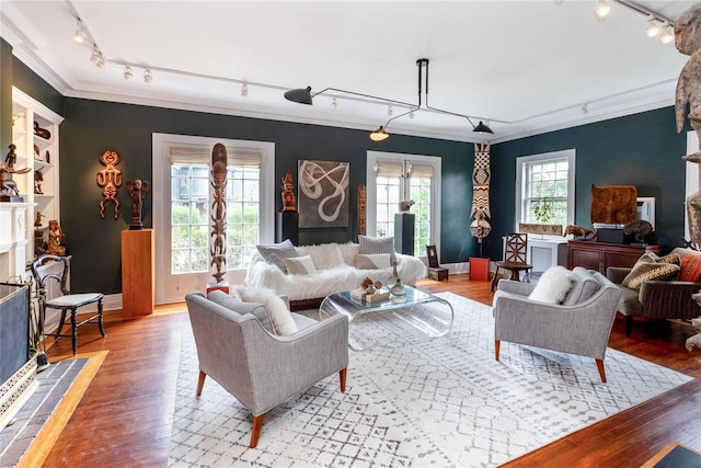 157 Alta Ave, Yonkers, NY 10705 - living room with track lighting, wood finished floors, baseboards, and ornamental molding