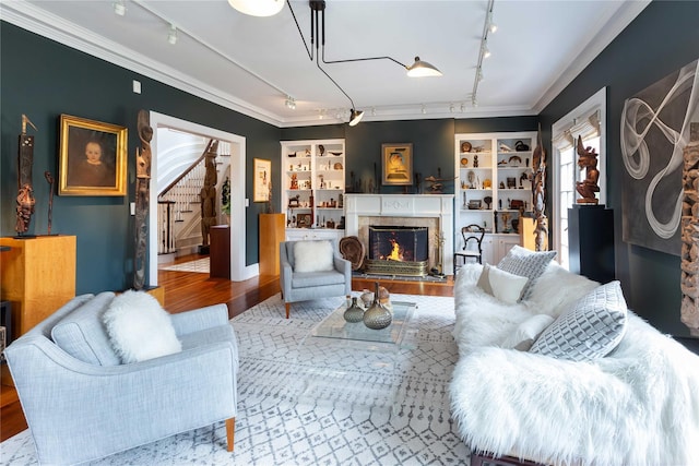 157 Alta Ave, Yonkers, NY 10705 - living room with rail lighting, stairway, a premium fireplace, and wood finished floors