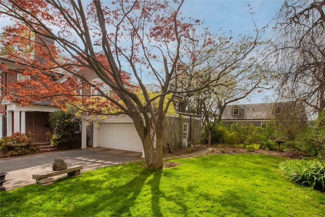 157 Alta Ave, Yonkers, NY 10705 - view of yard with concrete driveway and an attached garage