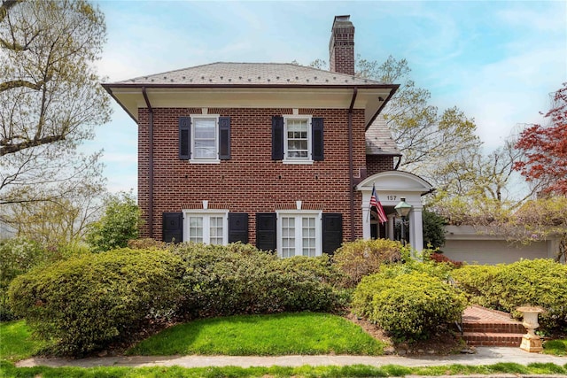 157 Alta Ave, Yonkers, NY 10705 - view of front of property featuring brick siding and a chimney