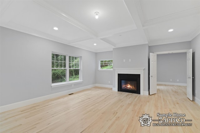 unfurnished living room with coffered ceiling, baseboards, a glass covered fireplace, wood finished floors, and beamed ceiling