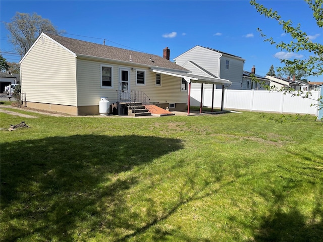 back of property featuring a chimney