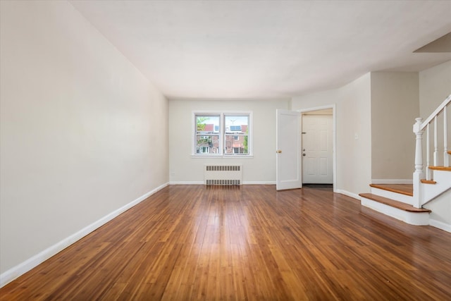 150-20 77th Ave, Kew Garden Hills, NY 11367 - interior space with radiator heating unit, baseboards, wood-type flooring, and stairs