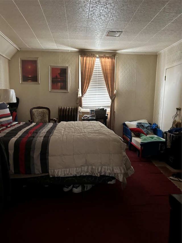 104-35 198th St, Saint Albans, NY 11412 - carpeted bedroom featuring visible vents and radiator heating unit