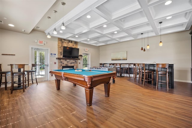recreation room featuring recessed lighting, wood finished floors, and a wealth of natural light