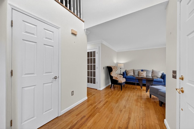 50 Roosevelt Dr, Poughquag, NY 12570 - sitting room featuring light wood finished floors and ornamental molding