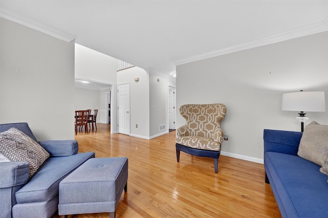 50 Roosevelt Dr, Poughquag, NY 12570 - living room with ornamental molding and light wood-type flooring
