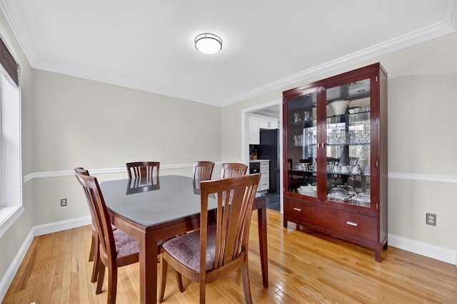50 Roosevelt Dr, Poughquag, NY 12570 - dining room featuring light wood-type flooring and crown molding