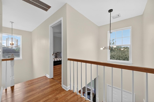 50 Roosevelt Dr, Poughquag, NY 12570 - hall featuring a chandelier and wood finished floors