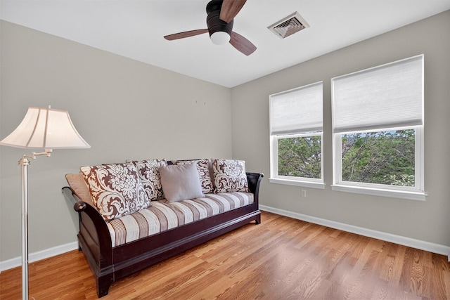 50 Roosevelt Dr, Poughquag, NY 12570 - living area with plenty of natural light, wood finished floors, and ceiling fan