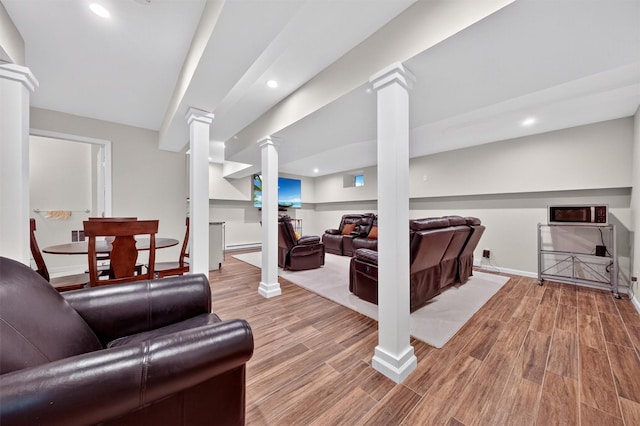 50 Roosevelt Dr, Poughquag, NY 12570 - living room with light wood-style floors, ornate columns, and recessed lighting