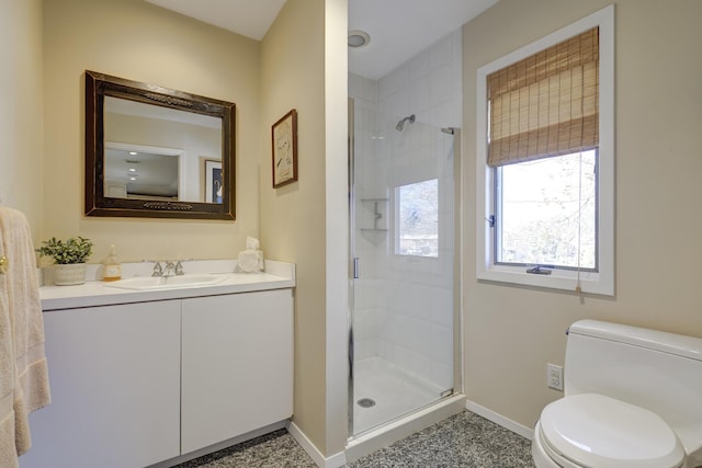 94 Schoolhouse Ln, Roslyn Heights, NY 11577 - bathroom featuring a stall shower, baseboards, vanity, and toilet