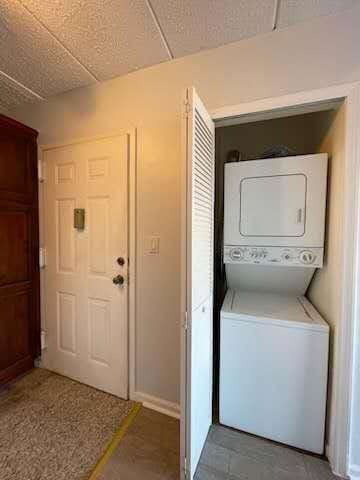 75-58 113th St Unit 4A, Forest Hills, NY 11375 - laundry room with laundry area and stacked washer and clothes dryer