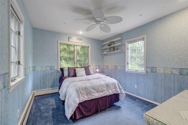 bedroom with wallpapered walls, a baseboard radiator, carpet floors, and ceiling fan