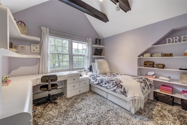 carpeted bedroom featuring an office area