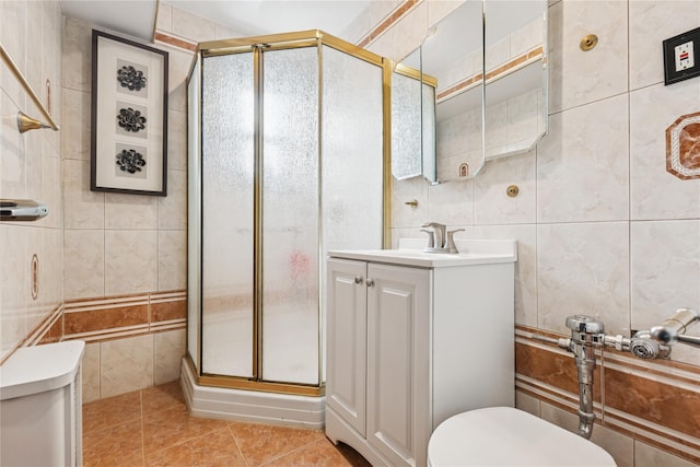 153-25 88th St Unit 3D, Howard Beach, NY 11414 - full bathroom featuring tile walls, a stall shower, vanity, and tile patterned floors