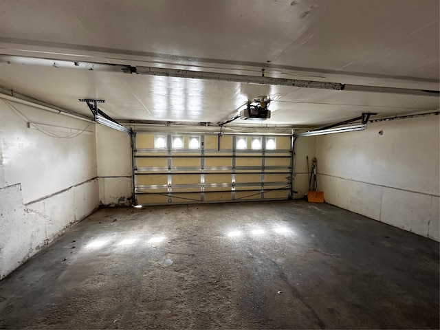 827 Eastfield Rd, Westbury, NY 11590 - garage featuring a garage door opener