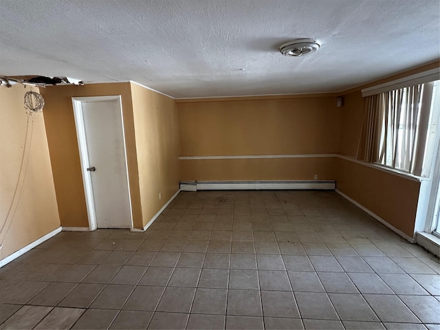 827 Eastfield Rd, Westbury, NY 11590 - unfurnished room with baseboards, a textured ceiling, light tile patterned floors, and baseboard heating