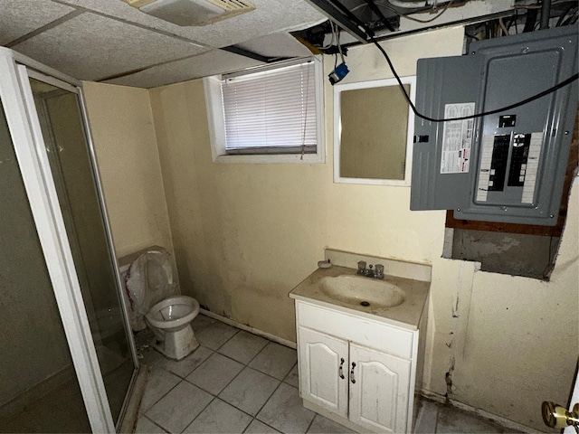 827 Eastfield Rd, Westbury, NY 11590 - full bath with vanity, toilet, tile patterned floors, electric panel, and a shower stall