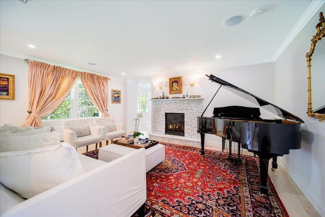 78 Schultz Hill Rd, Rhinebeck, NY 12580 - living area with crown molding, baseboards, wood finished floors, a stone fireplace, and recessed lighting