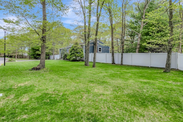 view of yard with fence