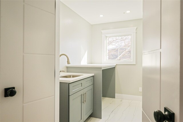 26 Kingston Ave, Hicksville, NY 11801 - clothes washing area featuring laundry area, marble finish floor, baseboards, recessed lighting, and a sink