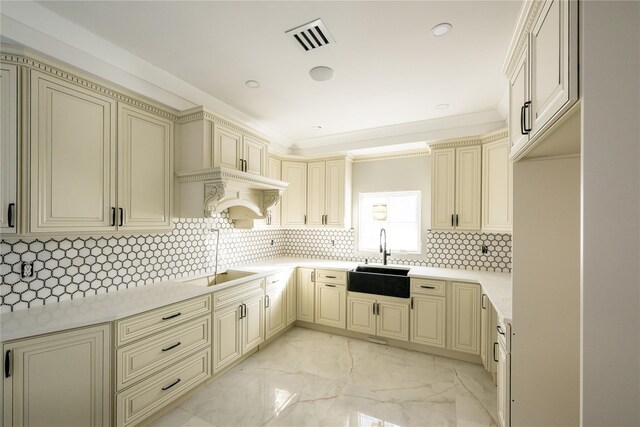 26 Kingston Ave, Hicksville, NY 11801 - kitchen with decorative backsplash, visible vents, cream cabinets, a sink, and marble finish floor
