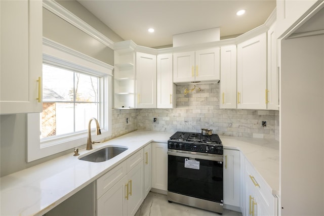 26 Kingston Ave, Hicksville, NY 11801 - kitchen with a sink, range with gas stovetop, open shelves, and white cabinetry