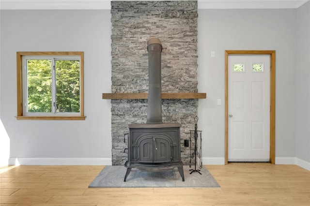 77 Greenwood Ln, White Plains, NY 10607 - detailed view of a wood stove, wood finished floors, and baseboards