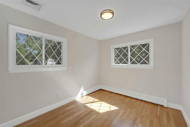 77 Greenwood Ln, White Plains, NY 10607 - spare room with baseboards and wood finished floors
