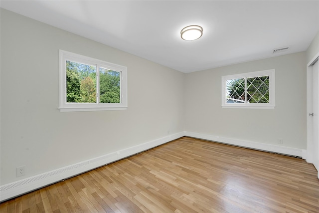77 Greenwood Ln, White Plains, NY 10607 - spare room with plenty of natural light, light wood-type flooring, and baseboards