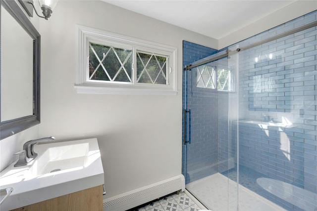 77 Greenwood Ln, White Plains, NY 10607 - bathroom with a baseboard heating unit, a stall shower, vanity, and tile patterned flooring
