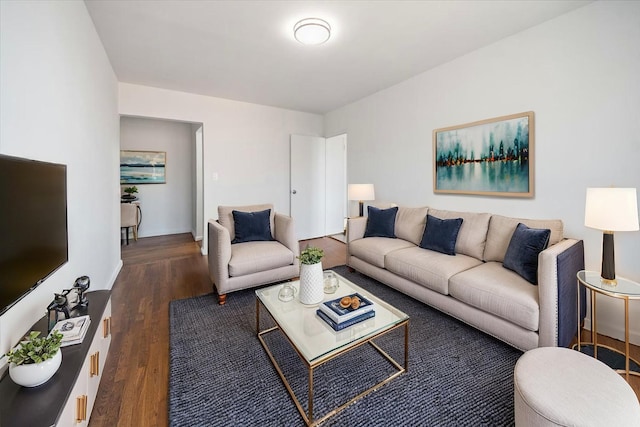 living room with wood finished floors