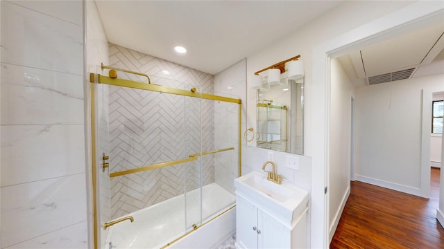 250 Cedar Hill Ave, Nyack, NY 10960 - full bathroom featuring enclosed tub / shower combo, wood finished floors, visible vents, baseboards, and vanity