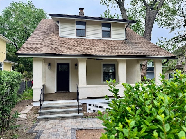 250 Cedar Hill Ave, Nyack, NY 10960 - bungalow-style house with stucco siding, a chimney, a shingled roof, central AC unit, and a porch
