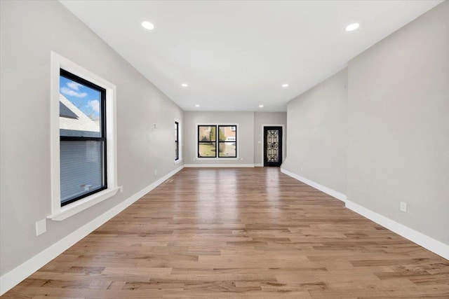 169 Bretton Rd, Yonkers, NY 10710 - empty room with baseboards, recessed lighting, and light wood-style flooring