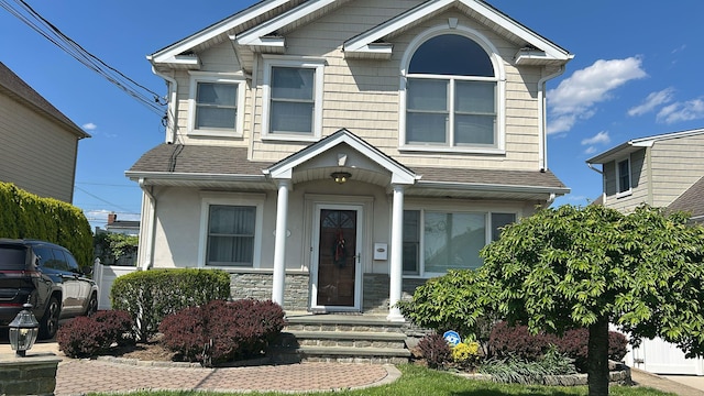 850 First Ave, Franklin Square, NY 11010 - view of front of home featuring roof with shingles and stone siding