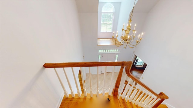11 Hidden Meadow Rd, Warwick, NY 10990 - stairway featuring a chandelier and wood finished floors