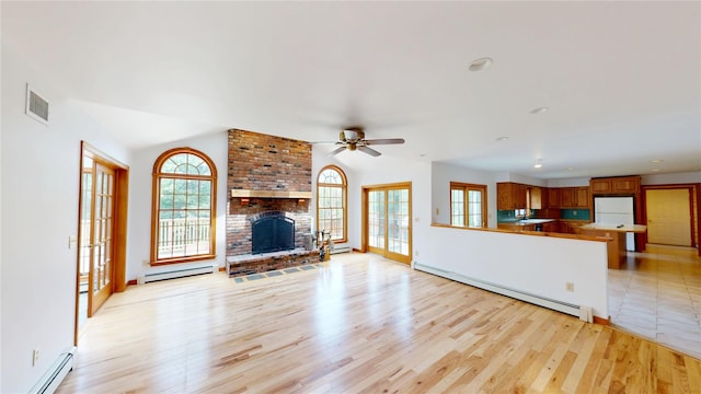 11 Hidden Meadow Rd, Warwick, NY 10990 - unfurnished living room with a baseboard radiator, a baseboard heating unit, light wood-style floors, ceiling fan, and recessed lighting