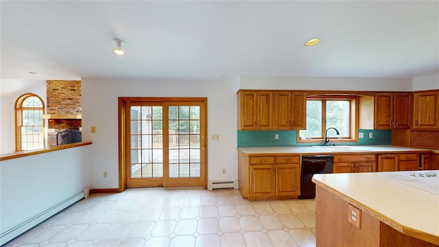11 Hidden Meadow Rd, Warwick, NY 10990 - kitchen featuring a baseboard heating unit, black dishwasher, light countertops, and brown cabinetry
