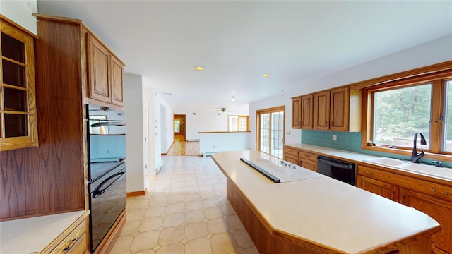 11 Hidden Meadow Rd, Warwick, NY 10990 - kitchen with black appliances, healthy amount of natural light, light countertops, a kitchen island, and recessed lighting